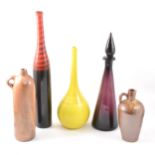 A collection of stoneware bottles, and contemporary glass vessels