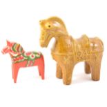 A Bitossi Aldo Londi Tang style horse in mustard glaze, and a Nuils Olsson painted horse