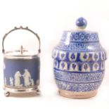 A Wedgwood blue jasperware biscuit box, and a Continental storage jar