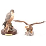 A Doulton Peregrine Falcon figure, and a Beswick Bald Eagle