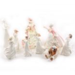 Eight Royal Doulton figurines, plus a Royal Crown Derby paperweight bear.