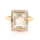 A mint quartz and diamond ring.