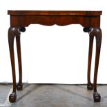 Reproduction burr walnut foldover card table.