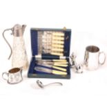 A box of silver-plated wares, glass claret jug Bacchus pourer, bread baskets, pedestal sugar, with