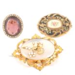 Two Victorian brooches and a ring converted from a brooch.