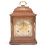 An Elliott walnut mantel clock