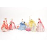 Seven Royal Doulton figures