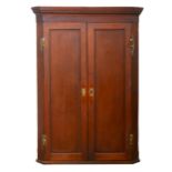 George III oak hanging corner cupboard.