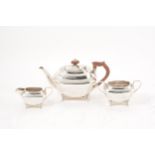 A silver three piece teaset by James Deakin & Sons, Sheffield 1922,