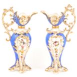 Pair of Coalport Coalbrookdale ewers,