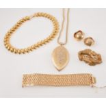 A collection of bold vintage gilt metal costume jewellery,