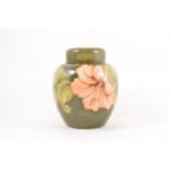 A large Moorcroft Pottery 'Hibiscus' Ginger Jar and cover