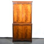 Reproduction mahogany cocktail cabinet.