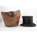 Leather top hat box and a black silk top hat