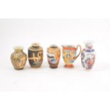 A quantity of Japanese Satsuma vases, pair of lidded boxes, dishes, jug etc.