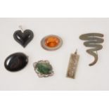 A black Lalique heart pendant, a silver modernist brooch, etc.