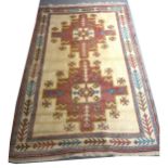 Persian syle rug hand knotted rug cream grownd, with two giometric octagons 256x157cm