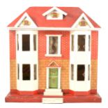 A 1940s wooden dolls house, Georgian style, with painted exterior