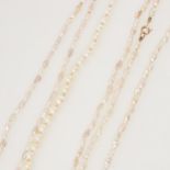 A freshwater vari-hue pearl three-strand necklace, plus freshwater and simulated single strand