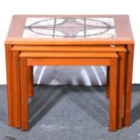 Nest of three Danish teak coffee tables, with tile insets.
