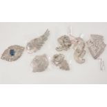 Eight quality unmarked paste set dress clips and brooches in the style of Trifari
