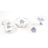 An extensive Queen's China Blue Iris pattern dinner service and teaset.