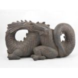 A cast metal dragon, bronze-effect patination