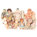 Victorian and later miniature dolls; twelve including bisque, wooden and celluloid examples.