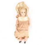A Victorian wax over composition head doll, rag body with composition limbs