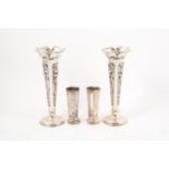 Pair of Art Nouveau silver spill vases and a nother smaller pair