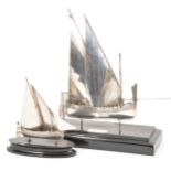 Maltese white metal model of a boat, and another smaller