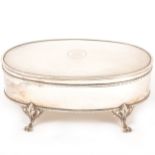 An Edwardian oval silver jewel box,