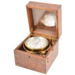 A marine chronometer,