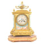 A Louis XVI style ormolu and Bleu Celeste porcelain mantel clock,