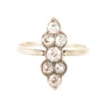 An Art Deco seven stone diamond ring.