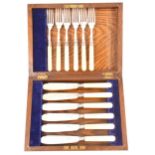 Set of six silver bladed fish knives and forks