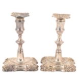 Near pair of George III silver dwarf candlesticks, William Cafe, London 1761 and 1763