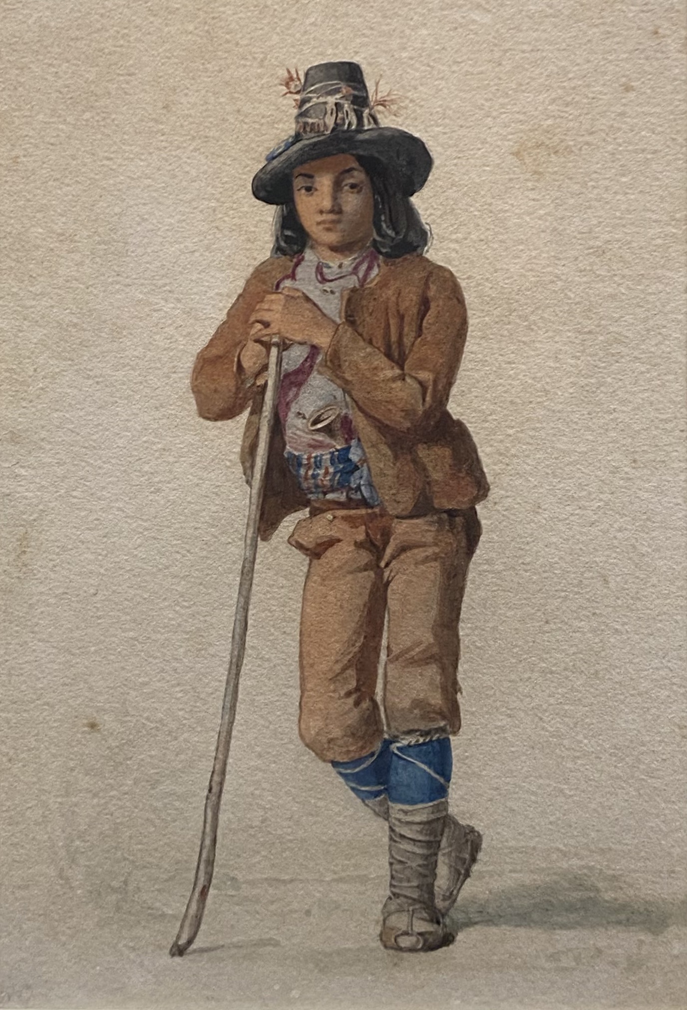 Italian School, mid 19th Century - A Roman Boy, resting on a staff