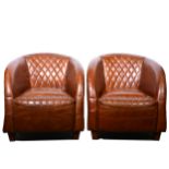 Pair of modern brown leather club chairs,