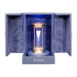 De Beers - A Diamond Hourglass containing a cascade of over 2000 natural rough diamonds.