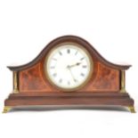 An Edwardian mahogany and yew wood mantel clock,