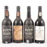 Four bottles of Vintage port - Dow's 1975 and Gould Campbell 1977