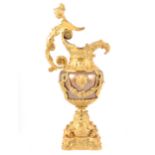 A Louis Philippe style bronzed and gilt metal ornamental ewer,