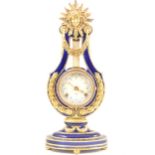 A reproduction Marie Antoinette lyre clock