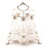 A George II style silver five bottle cruet,