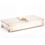 A silver box, converted to a jewel case,