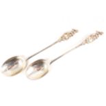 A pair of silver table spoons