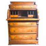 Victorian walnut cylinder top bureau