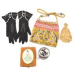 A collection of lady's vintage accessories, handkerchiefs, beaded bag and garter.