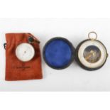 A brass cased travel aneroid barometer, (cased),
